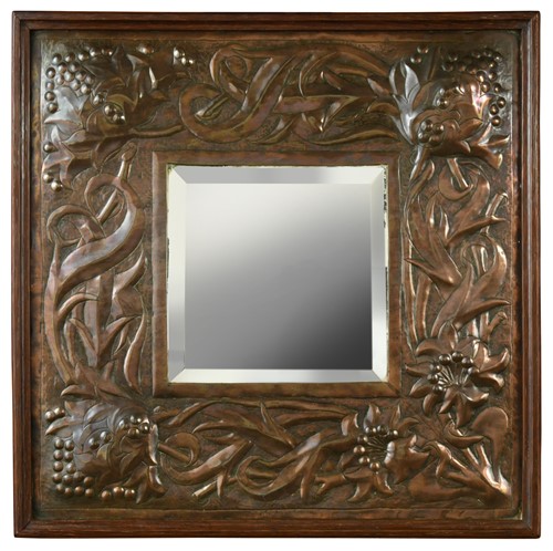 Lot 203 - An Arts & Crafts copper wall mirror