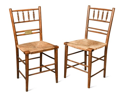 Lot 181 - A pair of Sussex chairs of Royal interest
