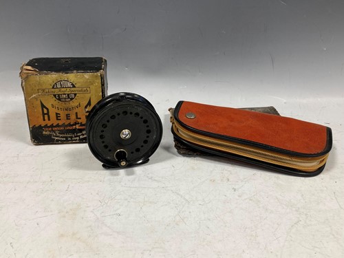 Lot 105 - A JW Young reel, a cased fishing reel;...