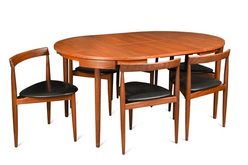 Lot 294 - Hans Olsen for Frem Rojle, a Danish teak extending dining table and six hideaway chairs, circa 1965