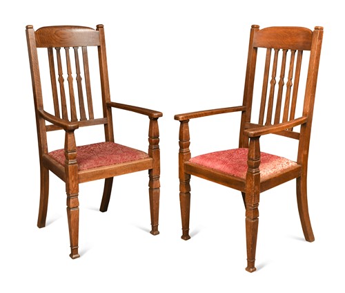 Lot 197 - Attributed to Shapland & Petter, a pair of Arts & Crafts oversized oak armchairs, circa 1900