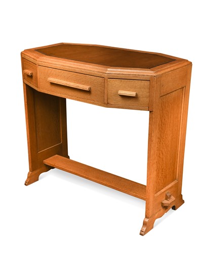 Lot 237 - A Heal's style oak writing table, circa 1930s