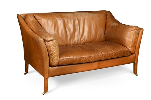 Lot 296 - A Danish style two-seat brown leather sofa
