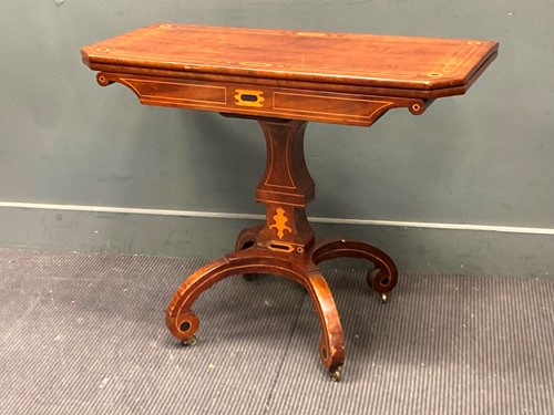 Lot 430 - A 19th century Italian line inlaid card table...