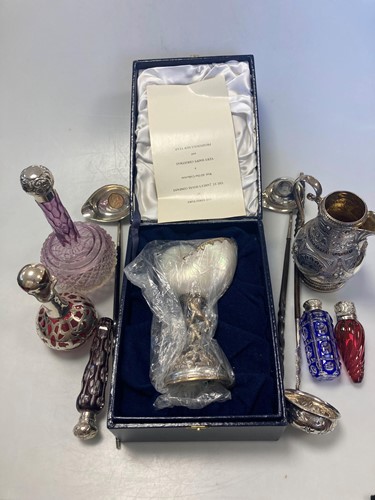 Lot 198 - A collection of silver mounted glass perfume...