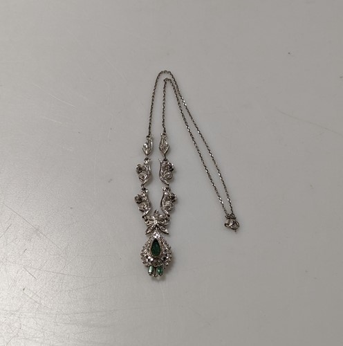 Lot 347 - A white metal emerald and diamond necklace,...