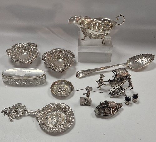 Lot 401 - A collection of silverware including sauce...