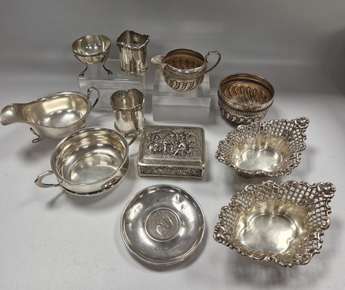 Lot 395 - A collection of silverware including a cased...