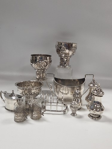 Lot 389 - A collection of silverware including cruets,...