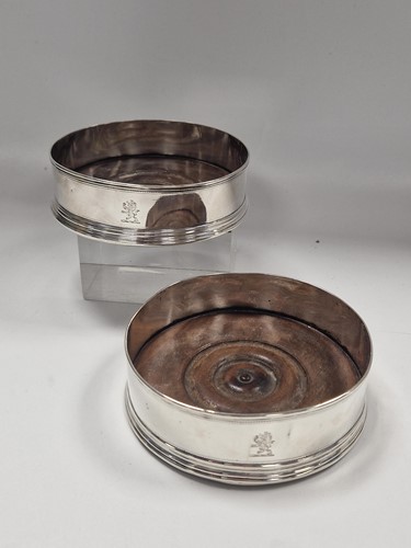 Lot 393 - A pair of (probably) Georgian silver bottle...