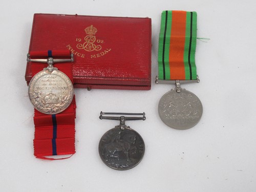 Lot 281 - A WWI medal awarded to SJT. T. W. Hicks; a...