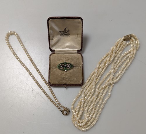 Lot 277 - A cased split pearl, diamond and enamel brooch...
