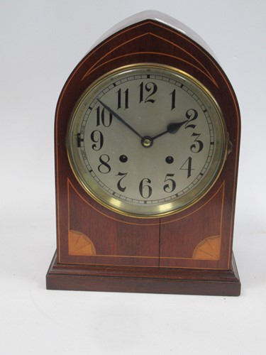 Lot 236 - An Edwardian mahogany mantel clock of pointed...