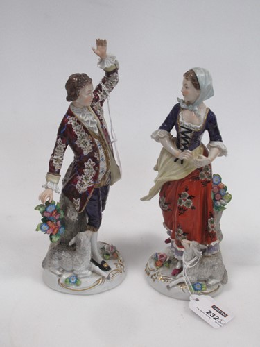 Lot 232 - A pair of Sitzendorf figures, of a man and a...