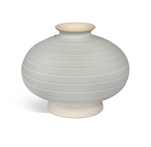 Lot 36 - Keith Murray for Wedgwood, an unglazed compressed baluster vase