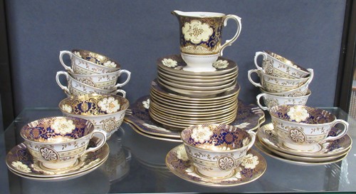 Lot 164 - A Crown Staffordshire tea service, decorated...
