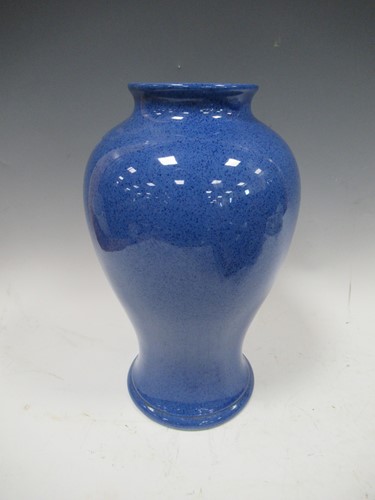 Lot 124 - A Moorcroft powder blue vase, 32cm high