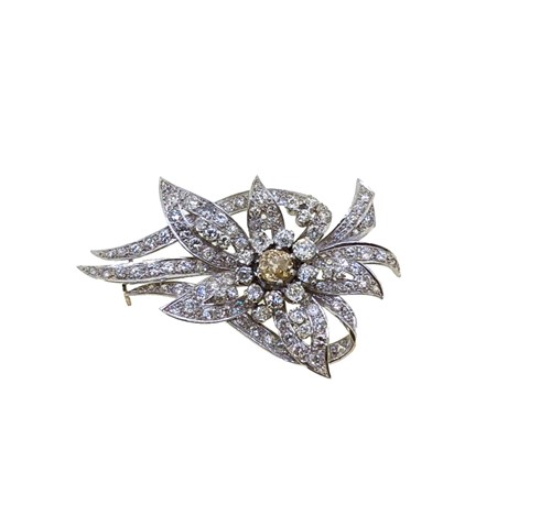 Lot 274 - Cropp and Farr - A diamond set floral brooch