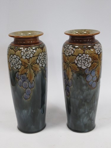Lot 239 - A pair of Royal Doulton vases decorated with...