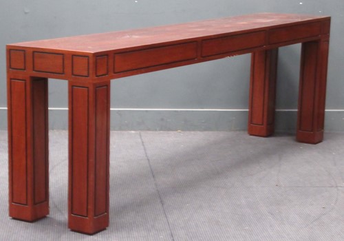 Lot 728 - A long fruitwood console table with ebonised...