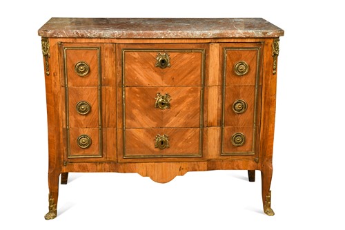 Lot 693 - A French transitional style kingwood marble topped commode, 19th century