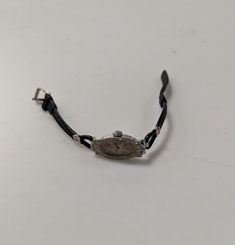 Lot 325 - A diamond set cocktail watch, interior marked...
