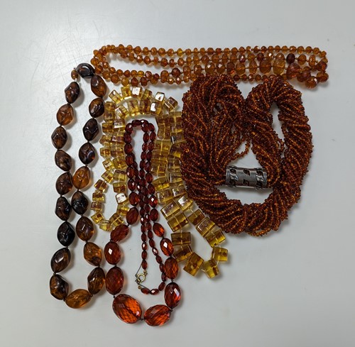 Lot 340 - A collection of amber and reconstituted amber...