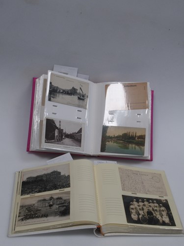 Lot 258 - Two First World War postcard albums, the first...