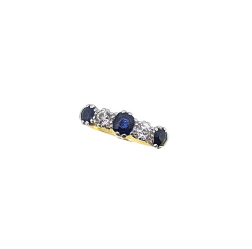 Lot 136 - A five stone sapphire and diamond ring