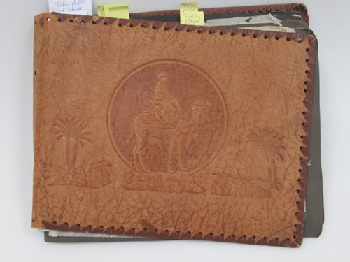 Lot 260 - Photograph album with embossed North African...