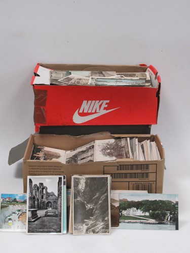 Lot 224 - Four boxes of postcards many being UK...