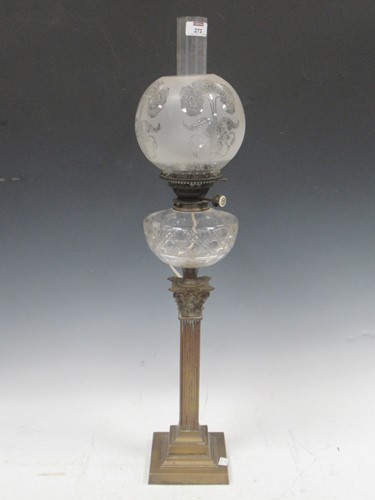 Lot 272 - A brass column table lamp with cut glass font...