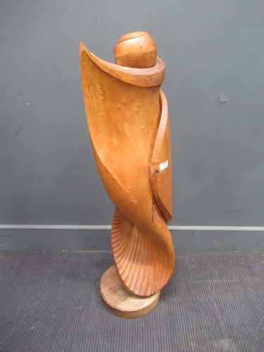 Lot 267 - A large fruitwood stylised scrolling sculpture,...