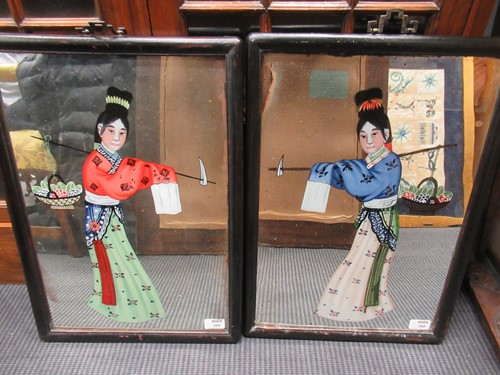Lot 266 - A pair of Chinese mirrors painted with women...