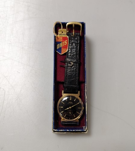 Lot 355 - A gold-plated watch by Oris with the original...