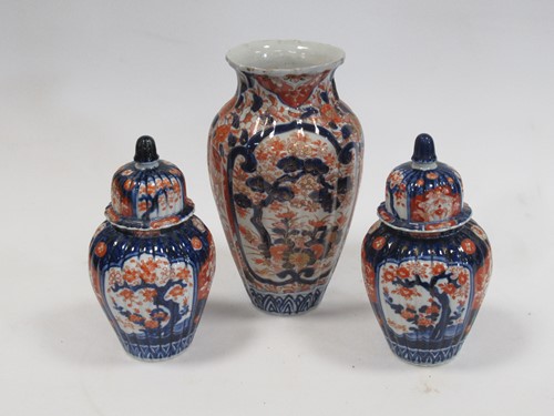 Lot 136 - A pair of Japanese Imari clobbered melon...