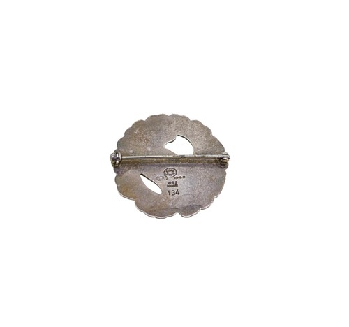 Lot 4 - Kristian Moehl-Hansen for Georg Jensen - A dove in a wreath brooch