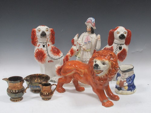 Lot 87 - A large Staffordshire model of a lion, a...