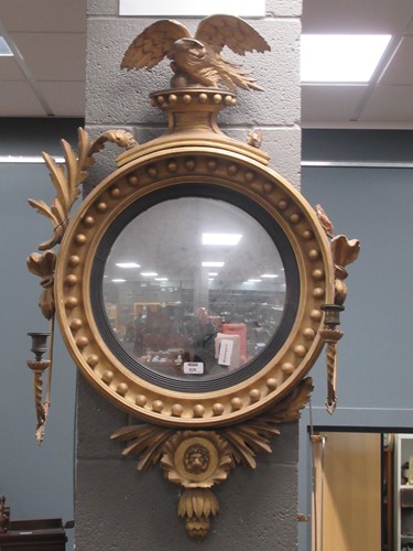 Lot 826 - A Regency design convex wall mirror 104 x 66cm