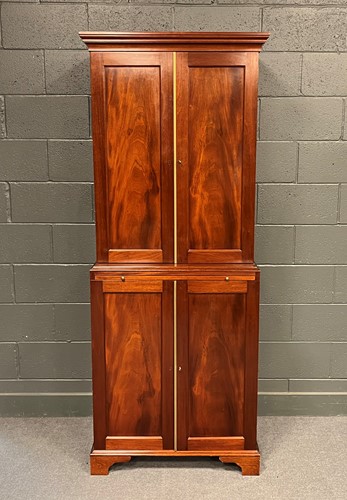 Lot 691 - A reproduction mahogany cabinet enclosed by...