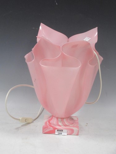 Lot 288 - A pink plastic handkerchief lamp with marbled...