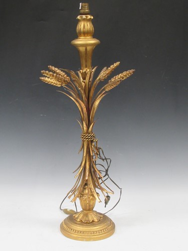 Lot 253 - A brass and gilt wood wheatsheaf table lamp in...