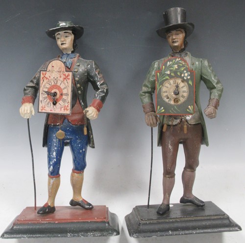 Lot 142 - Two Black Forest Peddlar timepiece painted...