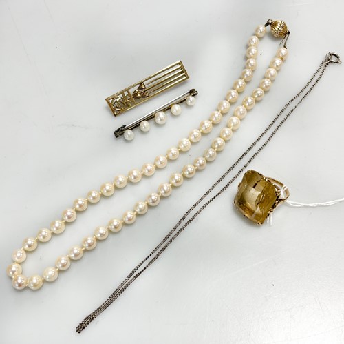 Lot 338 - A citrine dress ring stamped '9CT', and a...