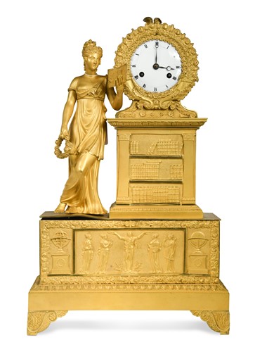 Lot 617 - A French Empire style ormolu mounted mantel clock circa 1840
