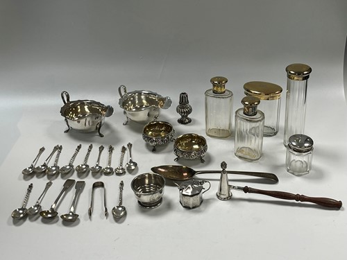 Lot 388 - A collection of silverware including sauce...