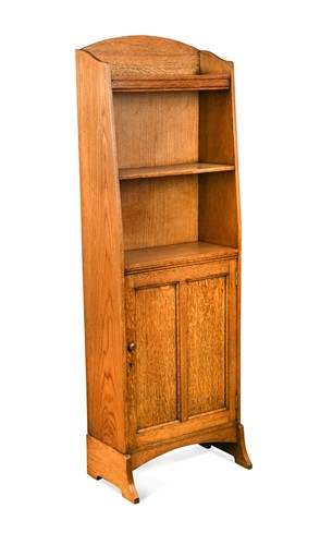 Lot 225 - An Arts & Crafts oak narrow bookcase cabinet, circa 1910