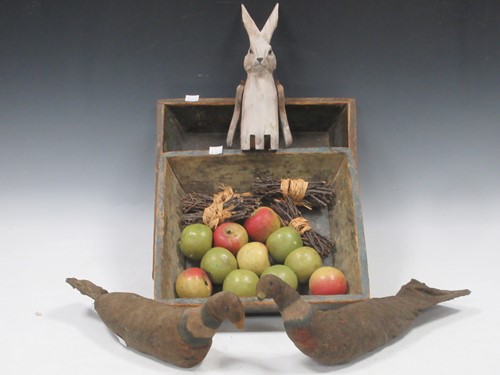 Lot 22 - Two painted pine trays containing faux apple candles, 2 model pigeons