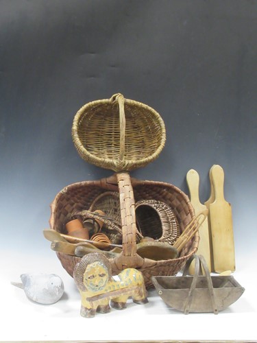 Lot 15 - A collection of baskets, antique butter pats,...