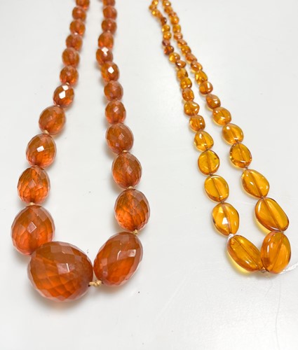 Lot 349 - An amber necklace, together with a constituted...